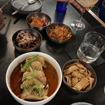 ANJU - Mandu, kimchi, Brussel Sprout Kimchi, spicy fish cakes, and sweet Soy-Braised Lotus Root - Korean Near Me - Washington, DC, District of Columbia