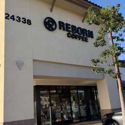 Exterior outside entrance of Reborn Coffee - Laguna Woods, California Exterior outside entrance of Reborn Coffee - Laguna Woods, California