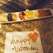 Photo of The Melting Pot - Tallahassee, FL, United States. Yin &amp; Yang dessert with special Happy Birthday plate.