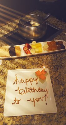 Photo of The Melting Pot - Tallahassee, FL, US. Yin & Yang dessert with special Happy Birthday plate.
