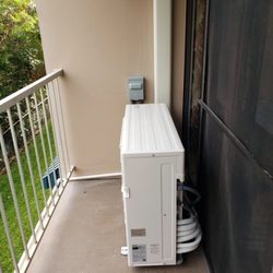 Dakine Air Condition & Heating - Compressor on lanai