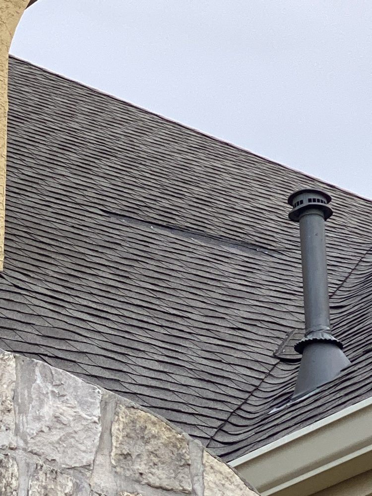 Slide of Dolan Roofing & Construction