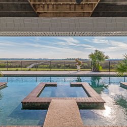 Brandy Keener - Carriage Properties - Gorgeous home with 60ft pool overlooking the Intracoastal Waterway