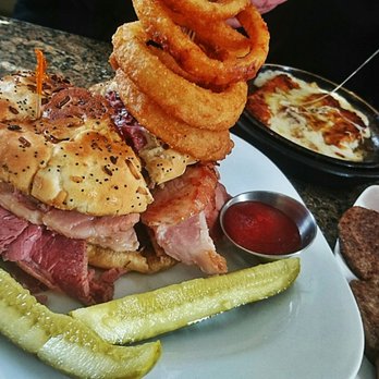 Harry's Corned Beef & Ham - Wayne's World Burger Omg Wowed Hamburger, Ham, Corned Beef, Cheese topped with Onion Rings only at Harrys - Sandwiches Near Me - Lincoln Park, Michigan Harry's Corned Beef & Ham - Wayne's World Burger Omg Wowed Hamburger, Ham, Corned Beef, Cheese topped with Onion Rings only at Harrys - Sandwiches Near Me - Lincoln Park, Michigan