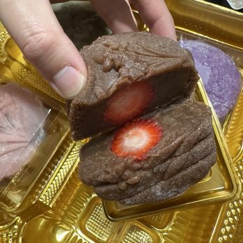 Sing Cheong Yuan Bakery - Cross section of chocolate strawberry moon cake - Bakeries Near Me - Honolulu, Hawaii Sing Cheong Yuan Bakery - Cross section of chocolate strawberry moon cake - Bakeries Near Me - Honolulu, Hawaii