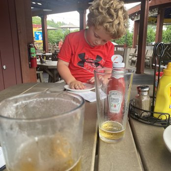 Bullfrogs Bar and Grill - My little man coloring on the patio. - American Near Me - Ortonville, Michigan