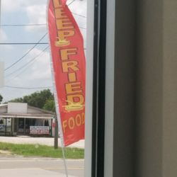 Golden Hooks - One of the banners in front of the place says "Deep Fried Food."