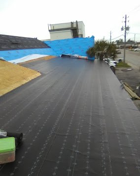 Slide of Lion Roofing