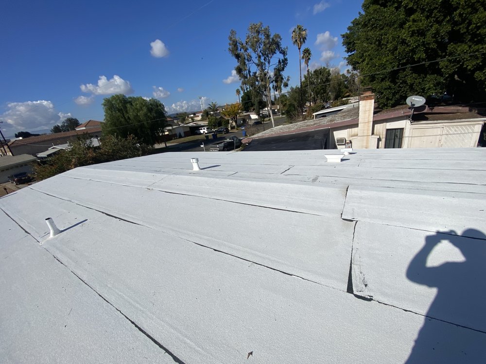 Slide of All American Construction and Roofing