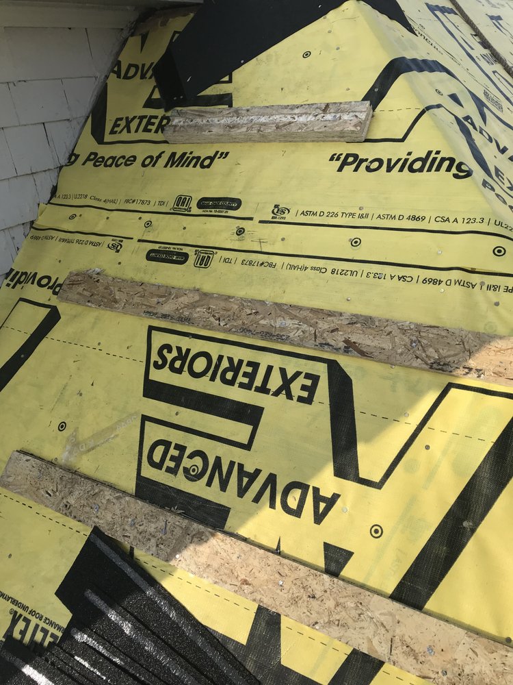 Slide of Mercedes Roofing