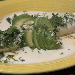 Toro Loco Authentic Mexican Restaurant - Ground beef burrito with avocado, cilantro and queso