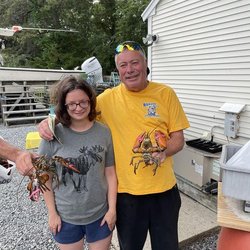 Fresh Cape Cod Lobsters By Jon Tolley - CAPTAIN JON WITH A LOYAL CUSTOMER