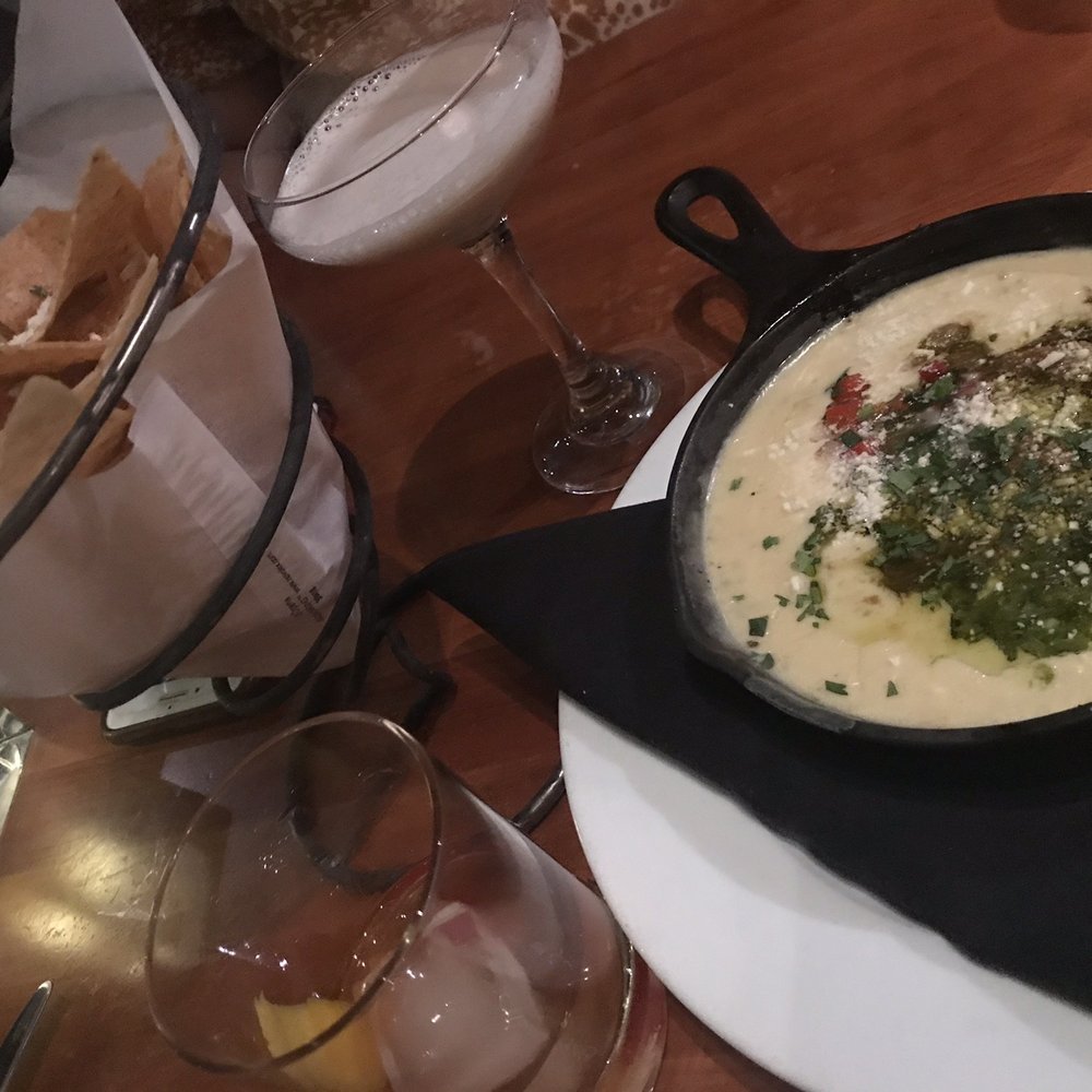 Roaring Fork - The queso with pork and chips and a side view of our old fashioned and chocolate martini drinks. - New American Near Me - Austin, Texas Roaring Fork - The queso with pork and chips and a side view of our old fashioned and chocolate martini drinks. - New American Near Me - Austin, Texas