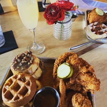 Taste Bar + Kitchen - Nashville hot chicken, pecan praline waffles, cornbread waffles and a mimosa - Cocktail Bars Near Me - Houston, Texas Taste Bar + Kitchen - Nashville hot chicken, pecan praline waffles, cornbread waffles and a mimosa - Cocktail Bars Near Me - Houston, Texas