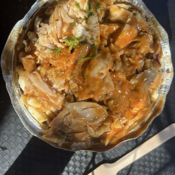 Ma Poule Mouillée - Spicy chicken poutine - Portuguese Near Me - Montreal, Quebec