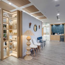 Metropolis Dermatology - This is another waiting area with coffee, drinks, and snacks.