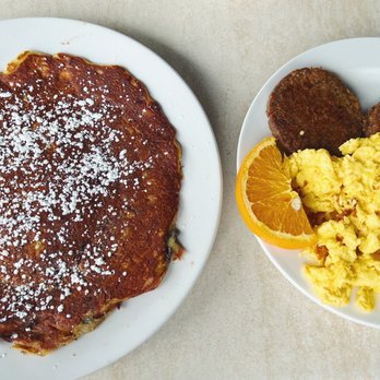 Famous Toastery - Chocolate chip Flapjack Breakfast Combo - flavored flapjack (chocolate chip), scrambled eggs with cheese and soy-sage - Breakfast & Brunch Near Me - Winston-salem, North Carolina Famous Toastery - Chocolate chip Flapjack Breakfast Combo - flavored flapjack (chocolate chip), scrambled eggs with cheese and soy-sage - Breakfast & Brunch Near Me - Winston-salem, North Carolina