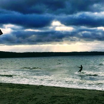 Double Bluff Beach - Cool shot of kiteboarder near Double Bluff Beach and Double Bluff Beach Club in Useless Bay. Photo credit: dbcabin.com. - Beaches Near Me - Freeland, Washington