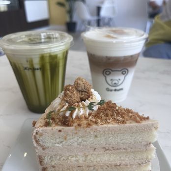 Gu-eum Cake & Bakery - Top row left: Jeju Green Tea Latte, Top row right: Black Sesame Latte, Bottom: Injeolmi Crumble Cake - Bakeries Near Me - Saratoga, California Gu-eum Cake & Bakery - Top row left: Jeju Green Tea Latte, Top row right: Black Sesame Latte, Bottom: Injeolmi Crumble Cake - Bakeries Near Me - Saratoga, California