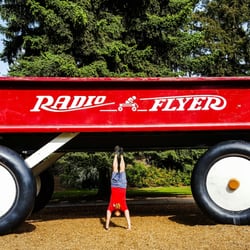 The Childhood Express - Red Wagon - There's actually monkey bars under the wagon but he wanted to do a handstand instead!