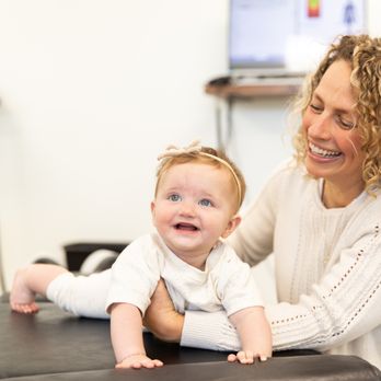 Shaffer Family Chiropractic - Dr. Carey Estabrook gently adjusting a baby to help her nervous system function better! - Chiropractors Near Me - Strasburg, Pennsylvania Shaffer Family Chiropractic - Dr. Carey Estabrook gently adjusting a baby to help her nervous system function better! - Chiropractors Near Me - Strasburg, Pennsylvania