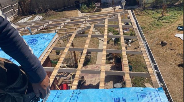 Slide of EJM Roofing & Remodeling