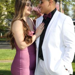 Men's Mart - Another happy client looking sharp in his perfectly tailored white suit from Men's Mart. Our team ensures a flawless fit for every occasion.