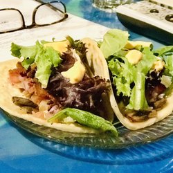HOOKS Lake Bar and Grill - Brisket & Sautéed Mushroom taco on a homemade tortilla!