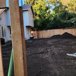 Fence and backyard demo during the process