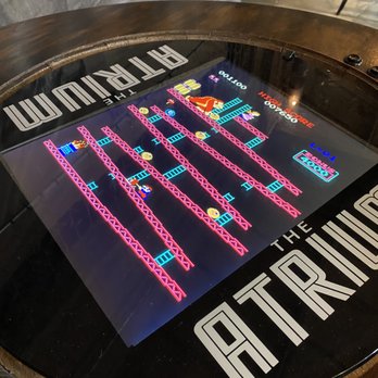 Fire on Fifth - a video game on a table - Pizza Near Me - Peru, Illinois