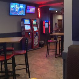 a view of a restaurant with arcade machines