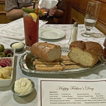 Michael's - Gratis antipasto served before our appetizers arrived - cheese, salami, olives, two types of bread, bread-sticks, crackers, and butter - Italian Near Me - Brooklyn, New York Michael's - Gratis antipasto served before our appetizers arrived - cheese, salami, olives, two types of bread, bread-sticks, crackers, and butter - Italian Near Me - Brooklyn, New York