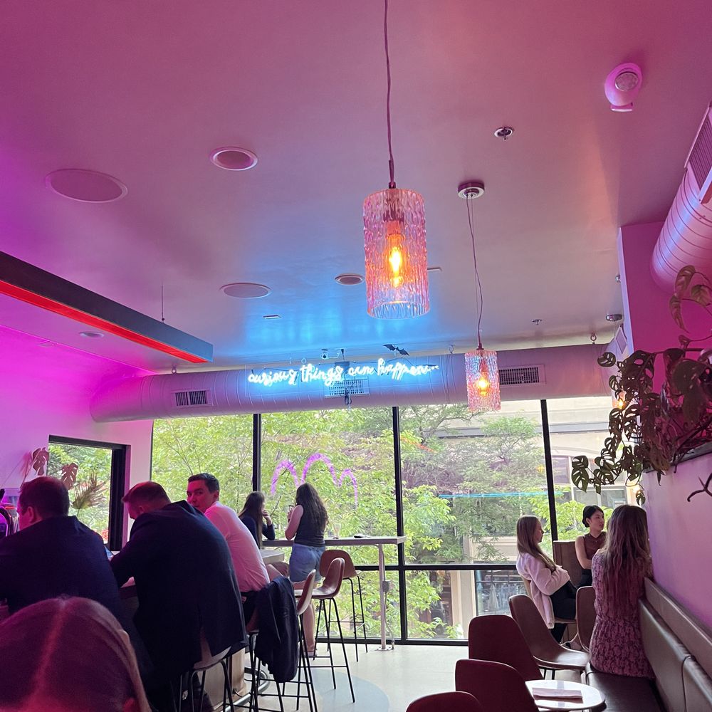 Fun neon sign over the window wall