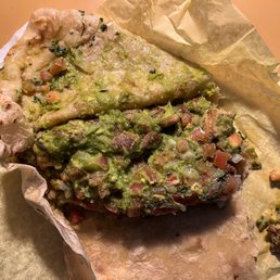 A close-up of the Chicken Burrito. Notice the colors. According to the menu it wasn't even supposed to have Pico de Gallo in it.