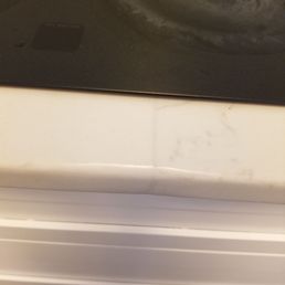 Damaged countertops on I. Tried to fix a small chip and sanded it down way too much to blend