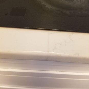 Avigna Granite World - Damaged countertops on I. Tried to fix a small chip and sanded it down way too much to blend - Building Supplies Near Me - Jacksonville, Florida