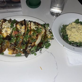 Junkanoo Cafe - Jerk chicken tacos and potato salad - Cafes Near Me - New Orleans, Louisiana Junkanoo Cafe - Jerk chicken tacos and potato salad - Cafes Near Me - New Orleans, Louisiana