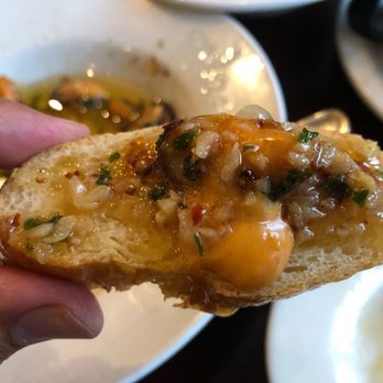 Esperpento - Bread dipped in the Patatas Bravas/Gambas Al Ajillo sauce- - Spanish Near Me - San Francisco, California