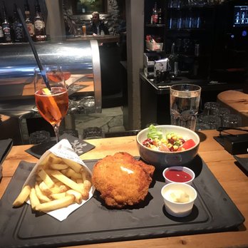 Brown Cow - Full portion of Chicken Cordon Blue ($20) and Spritz ($11). - Pubs Near Me - Zermatt, VS Brown Cow - Full portion of Chicken Cordon Blue ($20) and Spritz ($11). - Pubs Near Me - Zermatt, VS