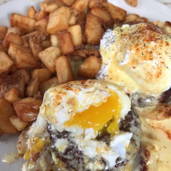 Mayfel's - Delicious eggs benedict (with friend green tomatoes) eaten on spring break - Southern Near Me - Asheville, North Carolina