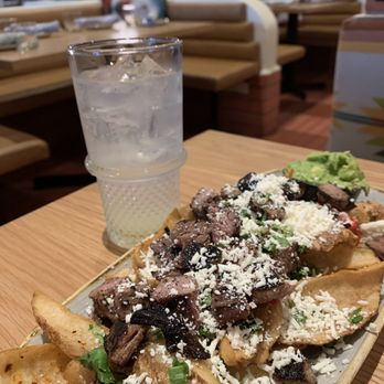 Lady Nomada - Mexican Kitchen - Ranch Water and Carne Asada Fries - Mexican Near Me - Arvada, Colorado Lady Nomada - Mexican Kitchen - Ranch Water and Carne Asada Fries - Mexican Near Me - Arvada, Colorado