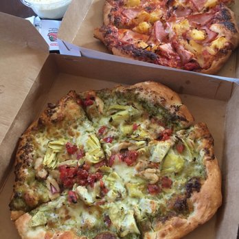 Tasty Pizza - Take out. The front is chicken pesto bruschetta and Hawaiian pizza in the back and limoncello. - Pizza Near Me - Omaha, Nebraska