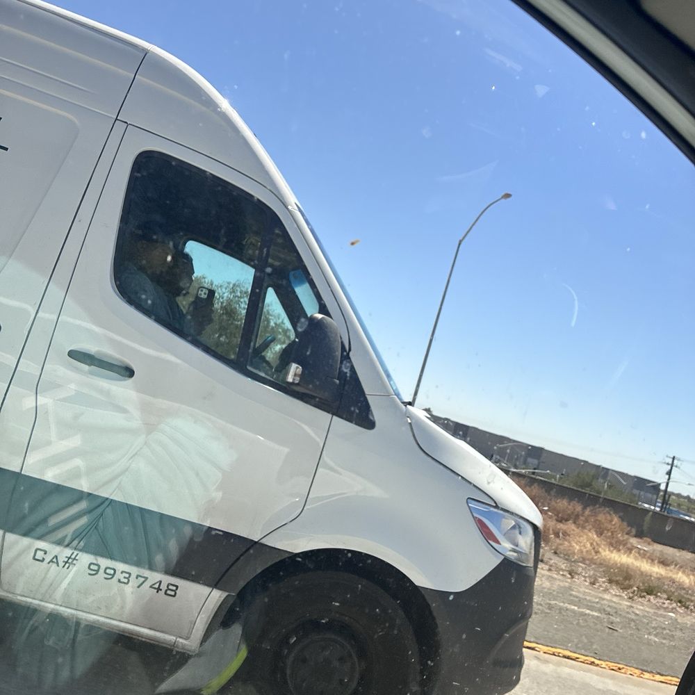 Eagle Shield - Work van in transit from job site in the Sacramento Area to their home city of Danville. Two guys dress as workers in the van. - Insulation Installation Near Me - Danville, California Eagle Shield - Work van in transit from job site in the Sacramento Area to their home city of Danville. Two guys dress as workers in the van. - Insulation Installation Near Me - Danville, California