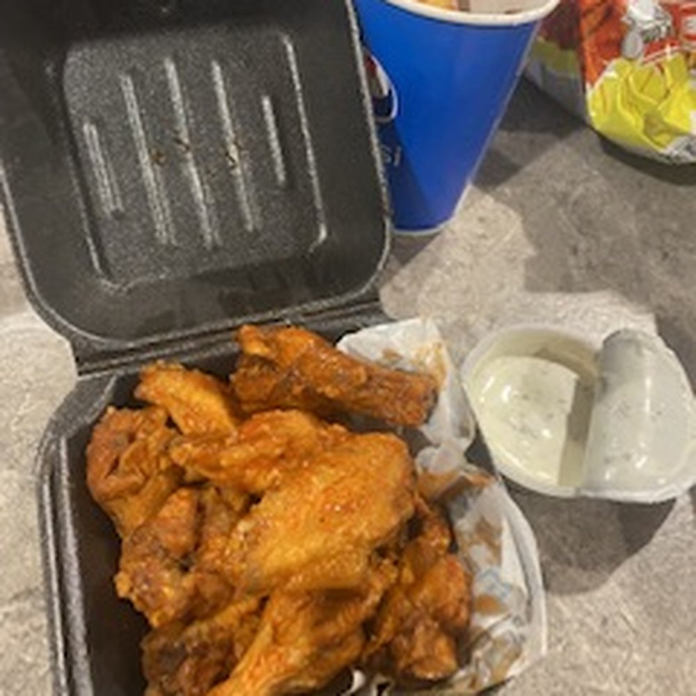 Wing Zone - a tray of chicken wings and a cup of yogurt - Chicken Wings Near Me - Loris, South Carolina Wing Zone - a tray of chicken wings and a cup of yogurt - Chicken Wings Near Me - Loris, South Carolina