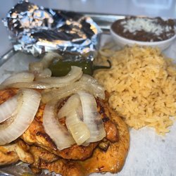 Mix Tacos - Grilled chicken served with rice, beans, tortillas and salad