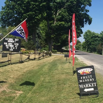 Clafeld Market - a sign in the foreground - Grocery Near Me - Prince Edward, Ontario