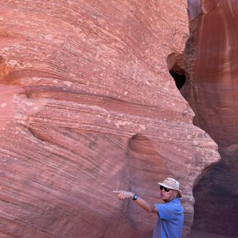 Antelope Canyon Navajo Tours - Leo telling us about the type of rock and its age. - Walking Tours Near Me - Page, Arizona Antelope Canyon Navajo Tours - Leo telling us about the type of rock and its age. - Walking Tours Near Me - Page, Arizona