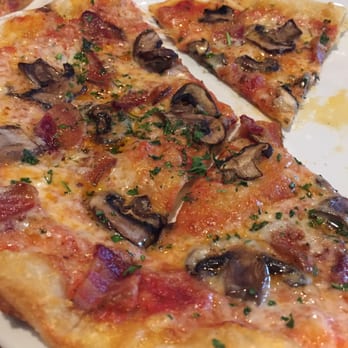 Basil & Mint Restaurant and Bar - Wild mushroom pizza with fontina cheese, bacon and truffle oil - Bars Near Me - Kelowna, British Columbia