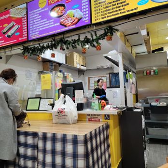Kimbap Paradise - a woman ordering food - Korean Near Me - Torrance, California Kimbap Paradise - a woman ordering food - Korean Near Me - Torrance, California