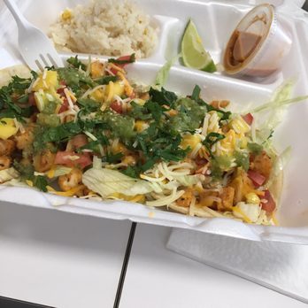 Holy Frijole - Fish tacos - 3 tacos w/ rice, looks like a salad here but the tacos are SO GOOD - Tex-Mex Near Me - Fort Worth, Texas